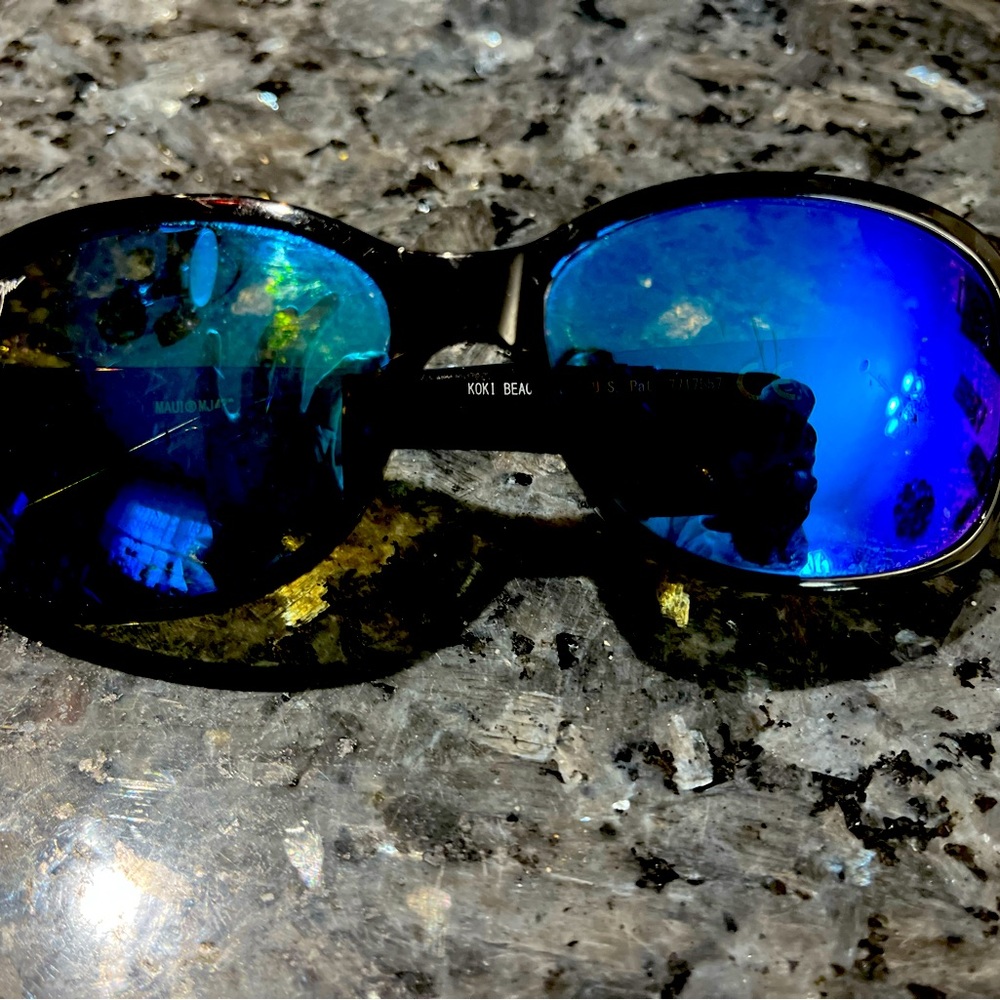Maui Jim sunglasses- black w blue lenses. Worn but still good!